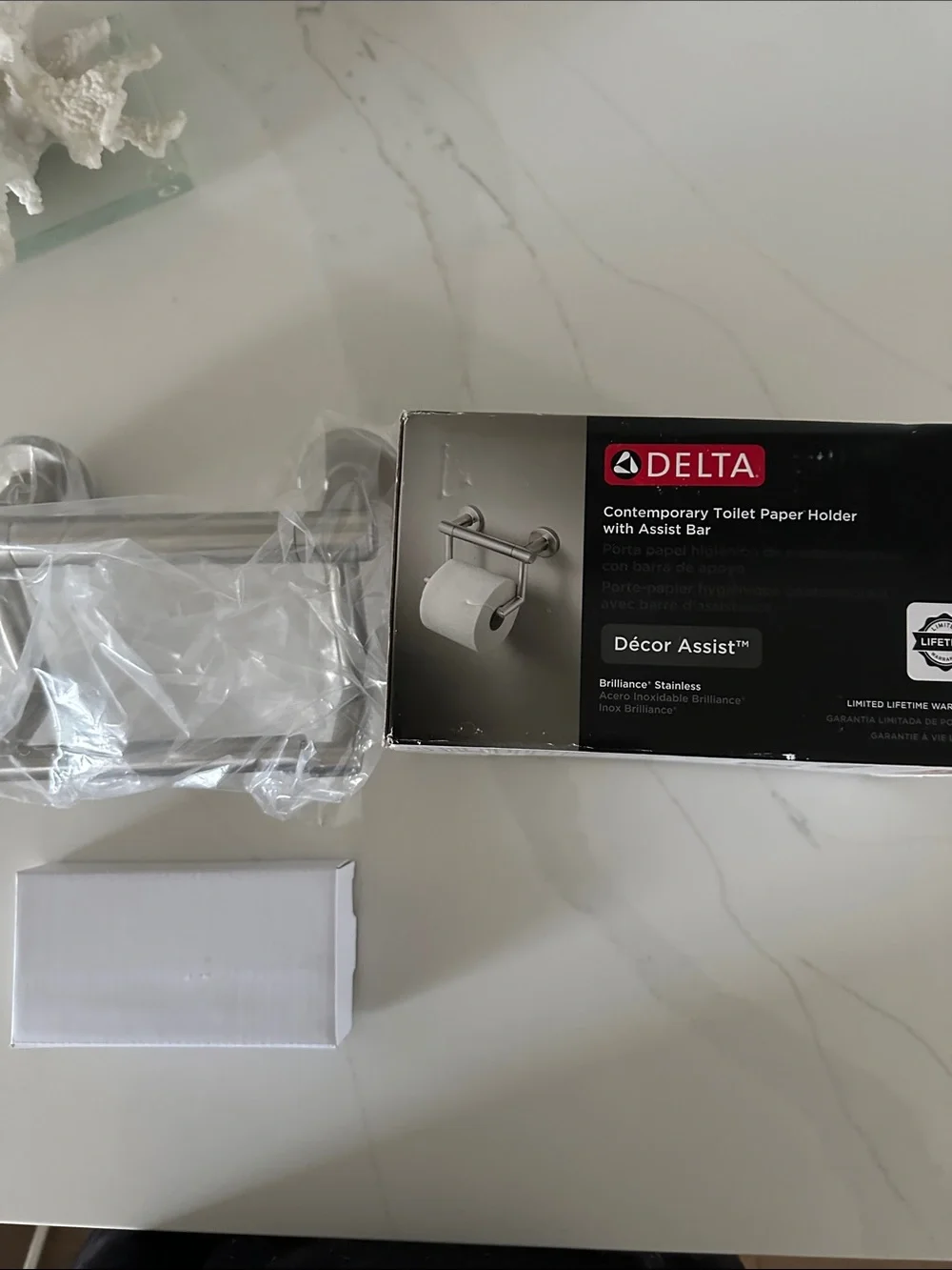 Delta Brushed Stainless Steel Toilet Paper Holder with Assist Bar. New in box.